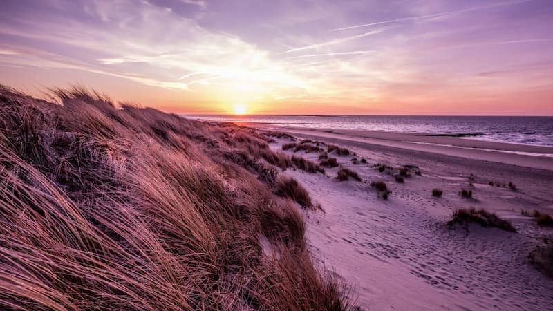 Strand Nederland zonsondergang
